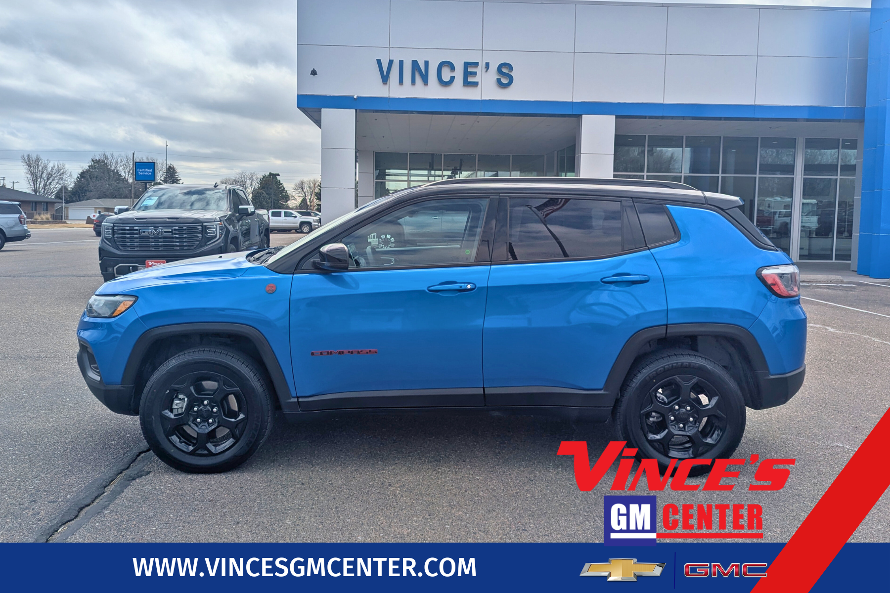 2024 Jeep Compass Trailhawk in Blue — front three-quarter view